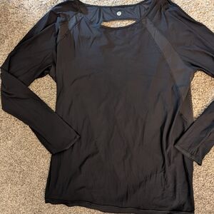 Athleta Stylish Black Long Sleeve Women's Top With Sheer Cut-Out Size Medium?